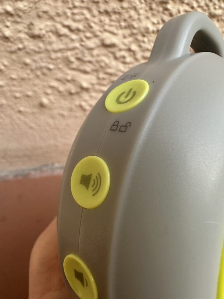 Yogasleep Hushh close up of power button, lock button, and volume buttons