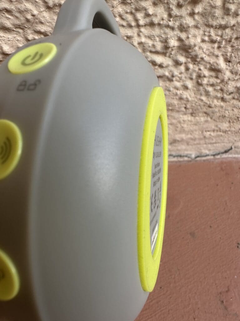 Yogasleep Hush portable baby sound machine close up of back silicon ring