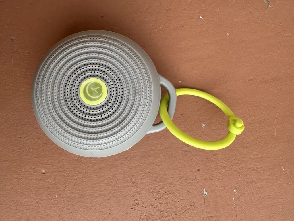 Yogasleep Hush portable baby sound machine front view with clip