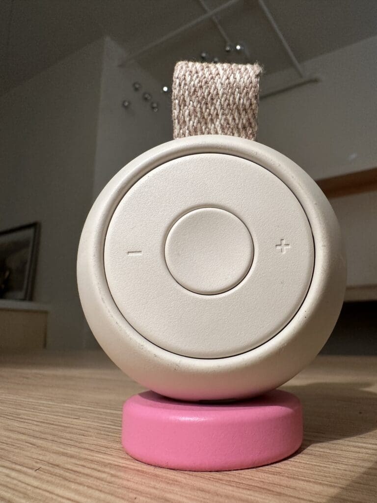 Hatch Go Portable Baby Sound Machine  Close Up Of Buttons On Desk