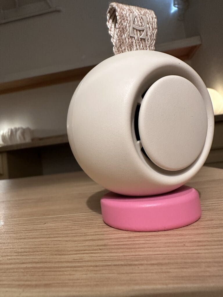 Hatch Go Portable Baby Sound Machine Close Up Of Front Speaker On Desk