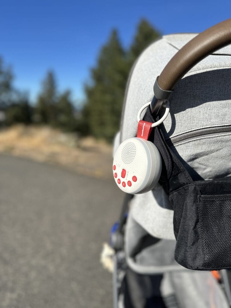 SlumberPod SlumberCalm hanging on stroller during walk with baby