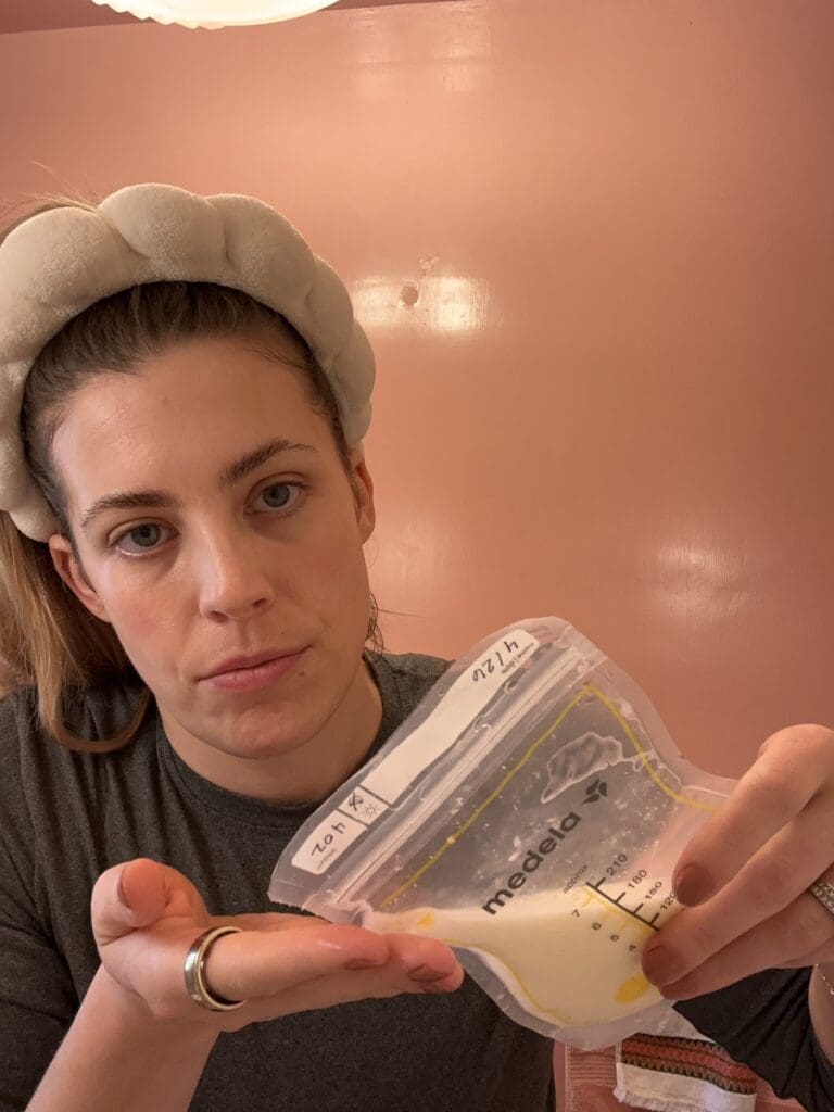 pooring expired breast milk into hand to use on skincare routine