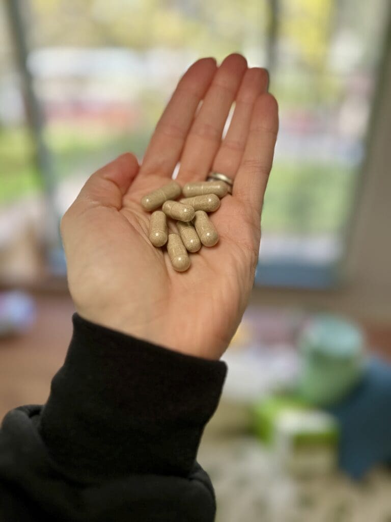 Healthy Hippie Lactation Supply Increaser Pump It Up Pills In Hand
