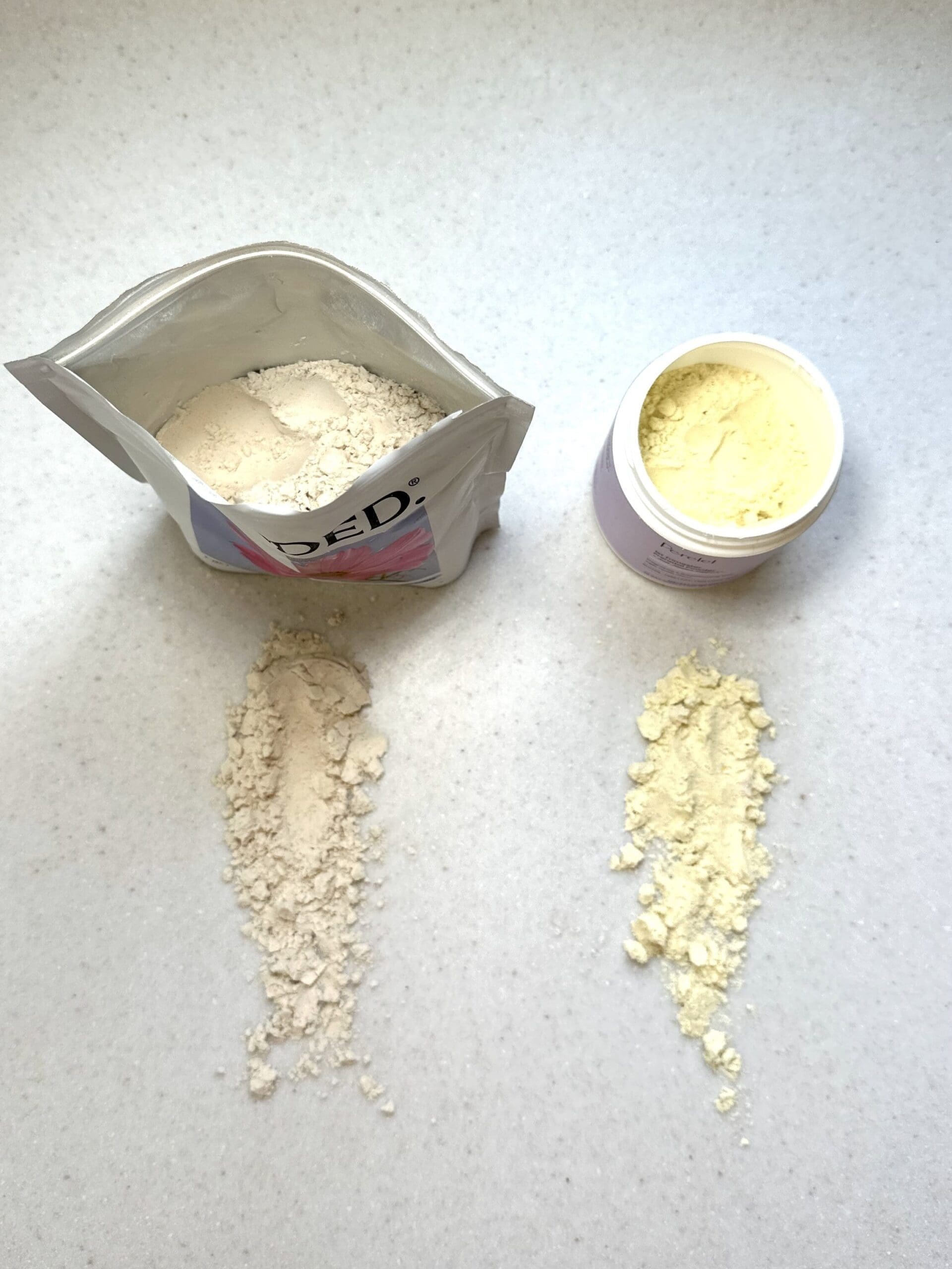 Needed vs. Perelel Prenatal Comparison powder on counter