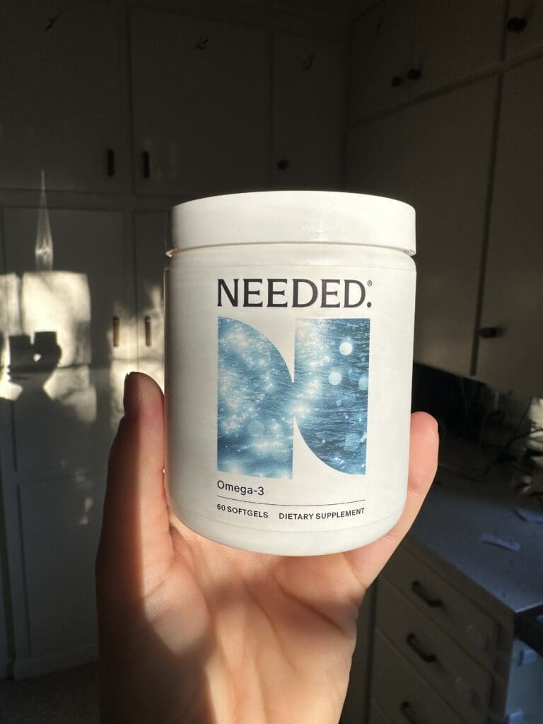 Needed Prenatals Omega-3 Bottle In Hand
